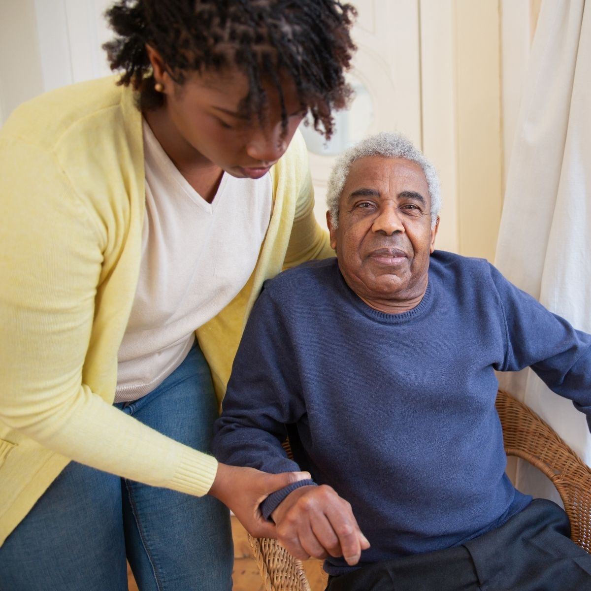 Divine Home Health Care - Professional caregiver with senior client